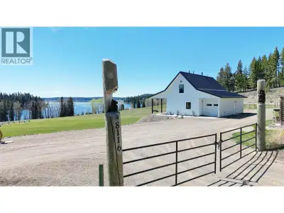 Overlooking Bridge Lake, this intelligently designed 4.54ac property was developed with practicality...
