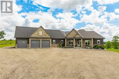 Welcome to your dream estate! This custom-built bungalow offers 5,500 sq ft of luxurious living spac...