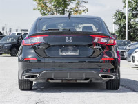 Experience the epitome of elegance and performance with the 2024 Honda Civic Sport Touring Hatchback... (image 5)