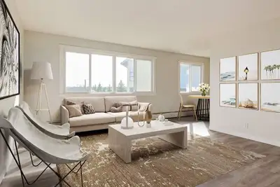 Amenities: City Views • Heat & Water Included • Affordable Parking Suite & Building: One-bedroom sui...