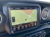 Discover the 2021 Jeep Wrangler Unlimited Sahara in striking Gecko Pearl – a rugged 4x4 built for ad... (image 6)