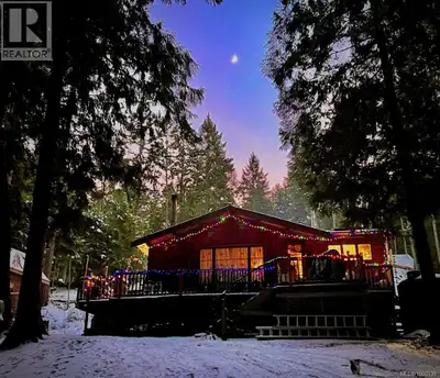 Beautiful Cedar Panabode log cabin for sale on Gulf Island, originally built in 1962 and relocated t...