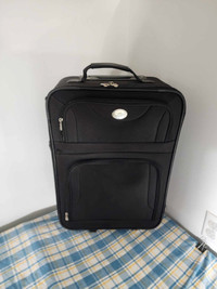 Luggage, 20"x15"x8", on wheels, Retractable push button locking