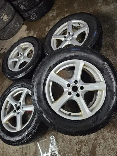Good set of Audi replica wheels on Pirelli winter tires. Will fit other VW, Audi and Mercedes. Wheel...