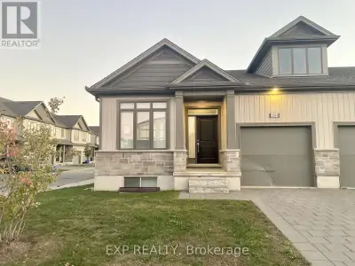 Spacious end-unit bungalow townhome in desirable Summerside offering over 2,400 sq. ft. of potential...