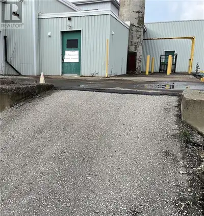 450 SQUARE FOOT WAREHOUSE/OPEN SPACE. CONCRETE FLOOR, WALLS ARE BRICK, CEILING INSULATED. GOOD LIGHT...