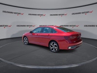 // ACCIDENT FREE!! // // SINGLE OWNER! // Finished in red with a black interior, this 2026 Volkswage... (image 5)