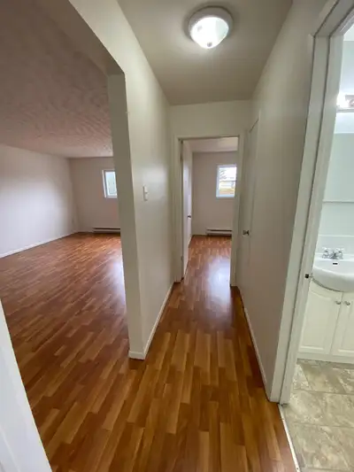 Available for occupancy this ADULT ONLY, NO SMOKING, NO PET building features open concept, laminate...
