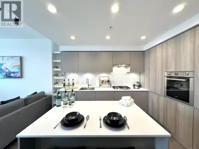 STRANG TEAM presents this junior 2-bed at City of Lougheed Tower 2 with 691 sq. ft., mountain views...