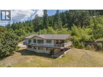 Stunning acreage with sweeping views of the Vernon Valley and Okanagan Lake, ideally perched in the...