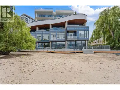Waterfront living reaches a new standard at Aqua Waterfront Village. This exceptional three-level be...