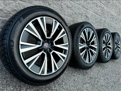 Michelin X-Ice Snow SUV Winter Tires and original 20 Inch Volvo XC 90 Matte Graphite Diamond Cut rim...
