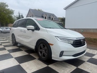 A spacious family minivan with comfortable seating, advanced safety features, and practical convenie... (image 2)