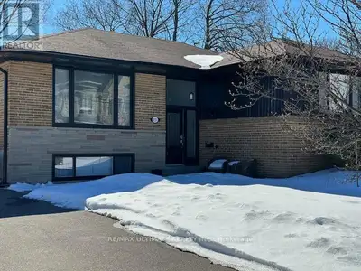 Experience contemporary comfort in this stylish lower-level 1-bedroom apartment in Bathurst Manor. D...