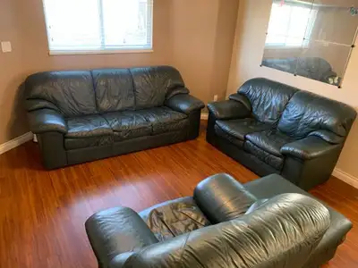 4 Piece Jade Green real Leather sofa set in excellent condition, View more