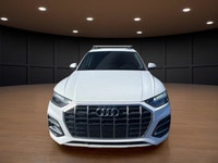 The 2021 Audi Q5 Komfort 45 TFSI quattro boasts a stunning white exterior that is both timeless and... (image 2)
