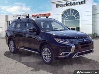 The 2022 Mitsubishi Outlander PHEV Black Edition brings together modern efficiency, bold styling, an... (image 7)