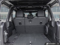 This Jeep Wrangler has a trusty Regular Unleaded V-6 3.6 L/220 engine powering this Automatic transm... (image 6)