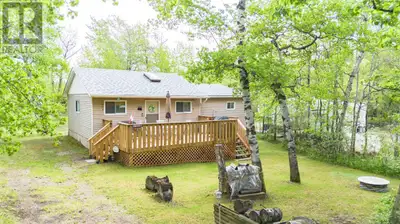 Cozy 3-Season Cabin Just Steps from the Shores of White SandsIf you are looking for a summer getaway...