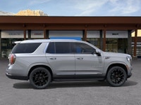 AMVIC Licensed Dealer The 2026 GMC Yukon 1500 SLT 4WD finished in Sterling Metallic is a full-size S... (image 9)