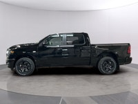 Step into the future with the commanding presence of the 2026 Ram 1500 Sport, presented in a stunnin... (image 1)