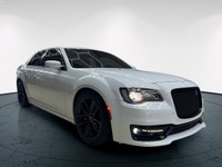 The 2023 Chrysler 300, particularly the 300C RWD in pristine white, is a powerful sedan that truly s... (image 6)