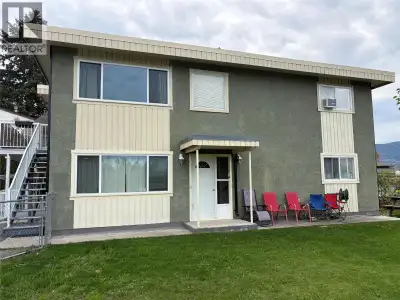 INCOME AND DEVELOPMENT OPPORTUNITY Full duplex situated on a generous 8200sqft corner lot in Pentict...