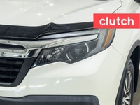 Auto Dimming Rearview Mirror, Front Heated Seats, Power Lumbar Support and more! Clutch is the large... (image 6)