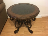 Round end table, cherry finish and metal