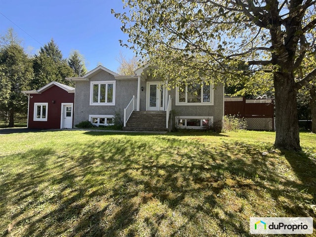 $615,000 - Bungalow for sale in Mont-Tremblant (St-Jovite) — photo 1