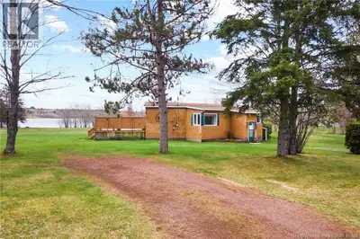 Welcome to your dream four-season retreat on the pristine shores of Grand Lake this beautifully upgr...