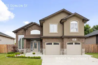 Welcome to 605 Donlon St., an exquisite 5+1bedroom, 4-bathroom raised ranch in the heart of LaSalle!...