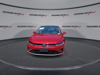 // ACCIDENT FREE!! // // SINGLE OWNER! // Finished in red with a black interior, this 2026 Volkswage... (image 2)