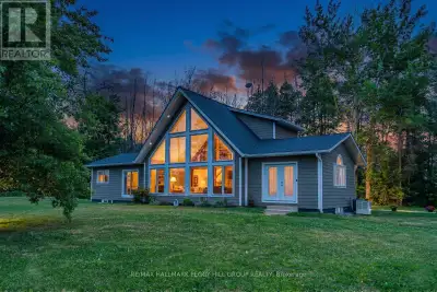 DISTINCTIVE BUNGALOFT WITH 3,300+ FINISHED SQ FT, A HEATED DETACHED 3-BAY SHOP, & MORE THAN HALF AN...