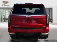 The 2021 Cadillac Escalade includes a panoramic sunroof, power-retractable running boards, hands-fre... (image 3)