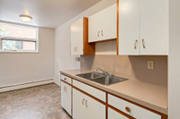 Amenities: Updated Appliances • Heat & Water Included • Storage Room Suite & Building: Bachelor, one... (image 8)