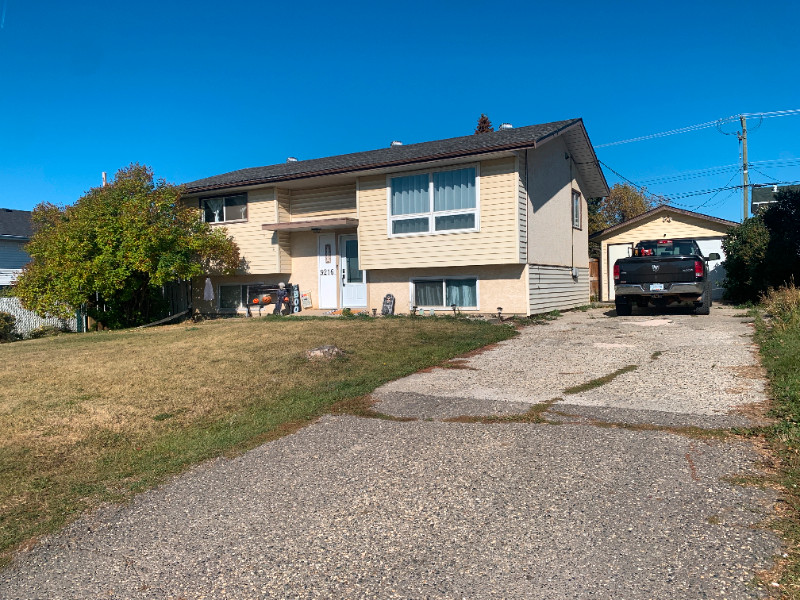 Turn-key home with a detached garage in Fort St John | Houses for Sale