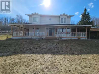 231.20 acreages, fenced with 5 stall carport, 3 bay shop, numerous outbuildings, deck, 2 patios, lar...