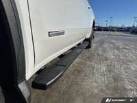 The 2026 GMC Sierra 1500 Elevation in a striking White finish is the perfect combination of power an... (image 9)