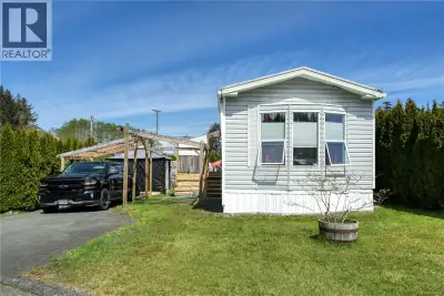 Lovingly cared for, 2 bed, 2 bath mobile home in a great location within the mobile home park. The b...