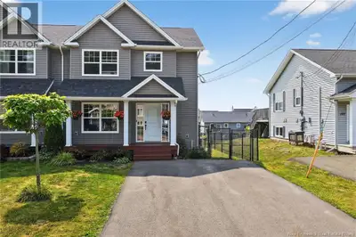 **QUICK CLOSING AVAILABLE** Get settled before the school year begins in this beautifully maintained...