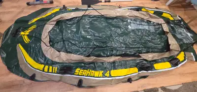 Intex Seahawk 4 inflatble boat set, used in good conditon, used last summer, no leaks, good for 4 ad...