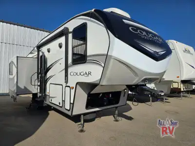 Keystone Cougar Half-Ton fifth wheel 27SGS highlights: Two Recliners Sleeper Sofa Peninsula Countert...