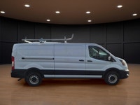 The 2023 Ford Transit Cargo Van, clad in a clean white finish and equipped with rear-wheel drive, of... (image 3)