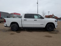 The 2026 Ram 1500 Black Express Crew Cab combines practical capability with a clean, modern design.... (image 7)