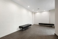 Fully renovated spacious suites with kitchen featuring chrome accents, laminate countertops, new ove... (image 6)