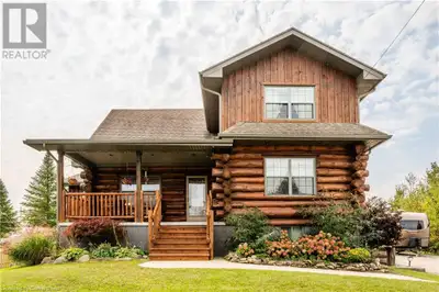 Move in and enjoy the summer in this custom designed, custom built, locally sourced white pine, log...