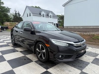 A well-equipped compact sedan with a refined interior, advanced tech features, and efficient turboch... (image 2)