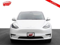 Check out this sleek 2021 Tesla Model Y! With its Long Range trim, AWD capability, and luxurious fea... (image 1)