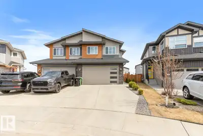Stunning 2-storey half duplex shows as a 10+ & is truly in show home condition! Offering 1641 sq.ft....